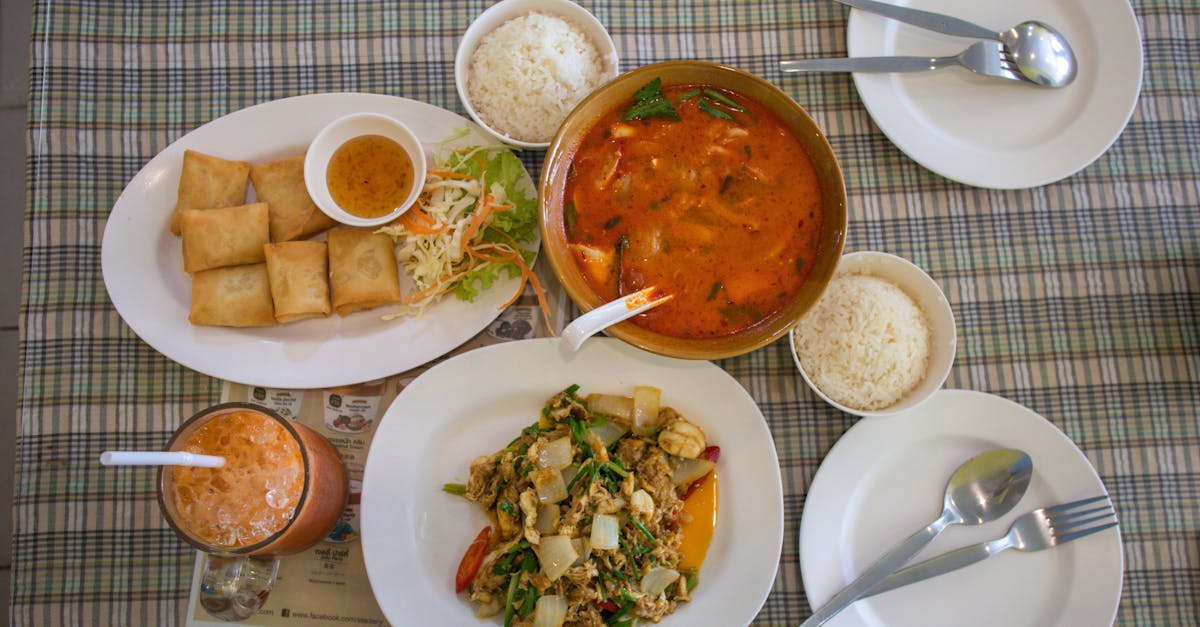 A Thai meal of tom yum soup, stir-fry, spring rolls and jasmine rice